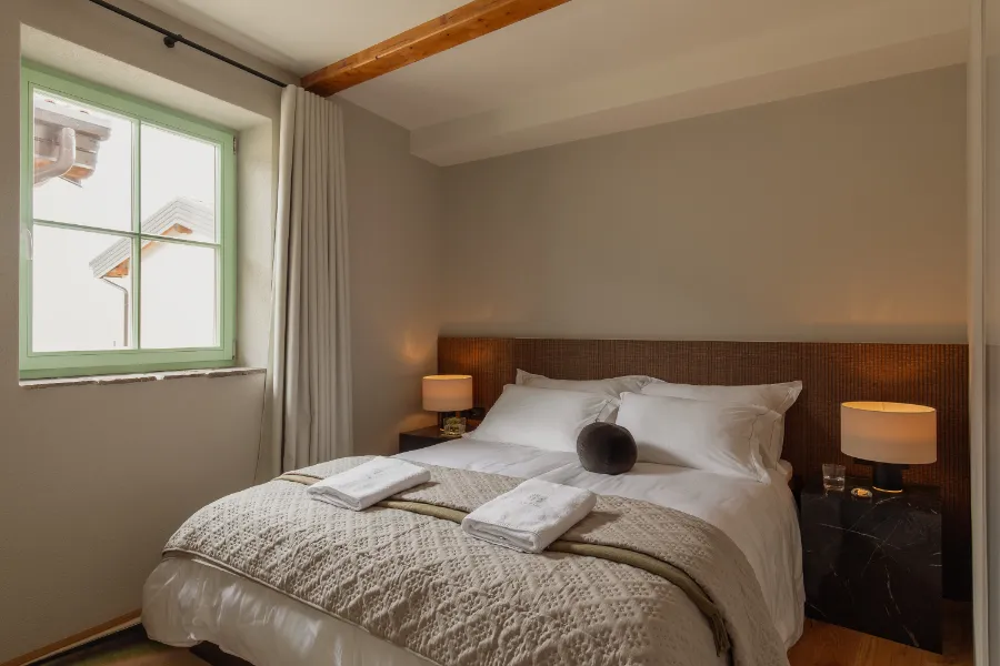 Postelja v apartmaju Brajda